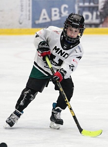 Andrij při zápase v místním hokejovém klubu